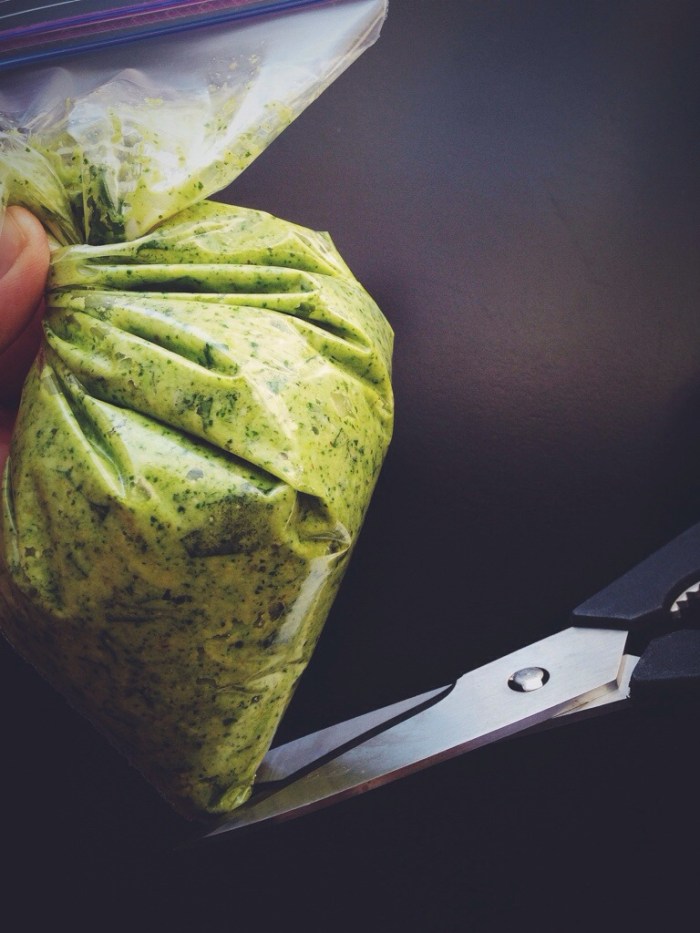 Snip the tip and use like a pastry bag to pipe onto the toasts