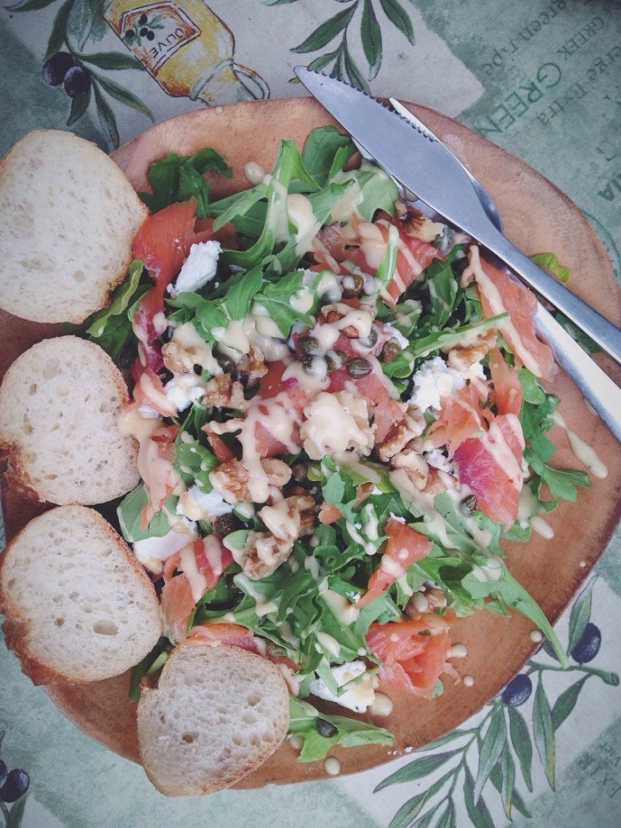 my lunch, a salmon, arugula, caper and toasted walnut salad with lemon dijion vinagrette