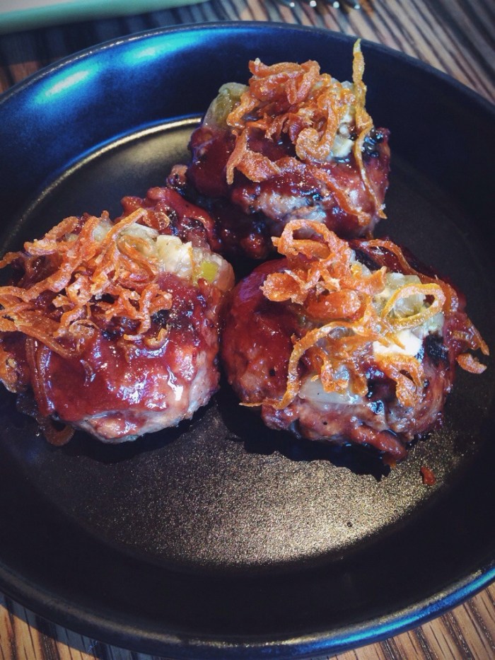 Bombdiggitybombbomb. Melt in your mouth meatballs topped with fried shallots.