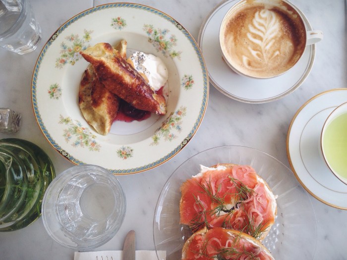 Homemade everything bagel with lox and fixins and perogis