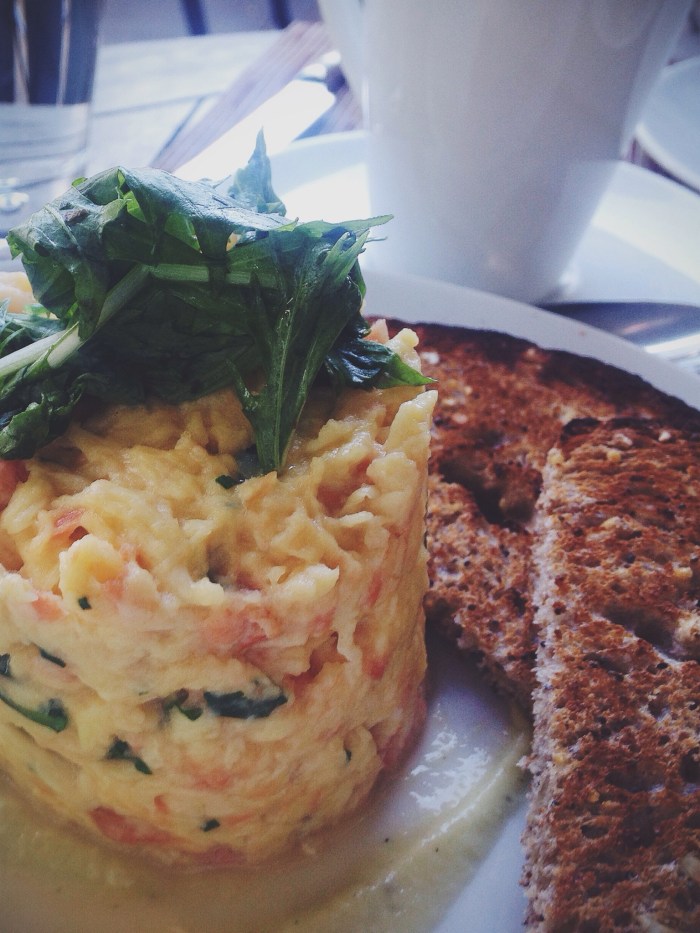 Slow cooked eggs with salmon and greens