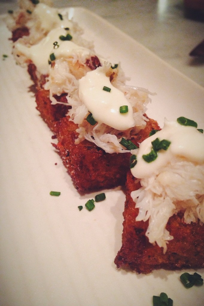 dungeness crab tater tots with creme fraiche and chives