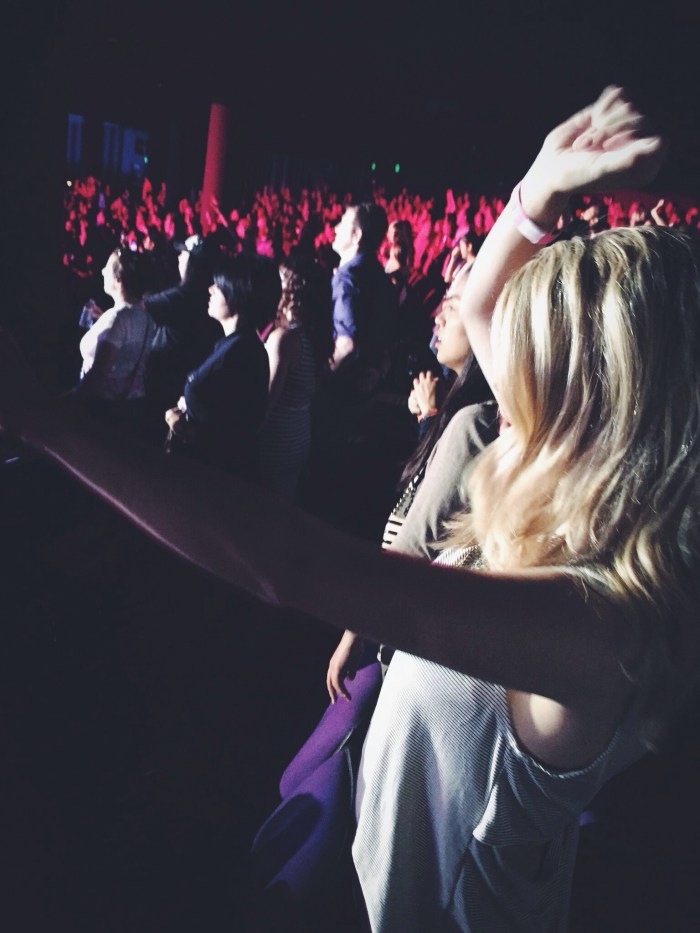 Everyone was standing but I'm pretty sure I was in a league of my own dancing. Big arms. Big arms.