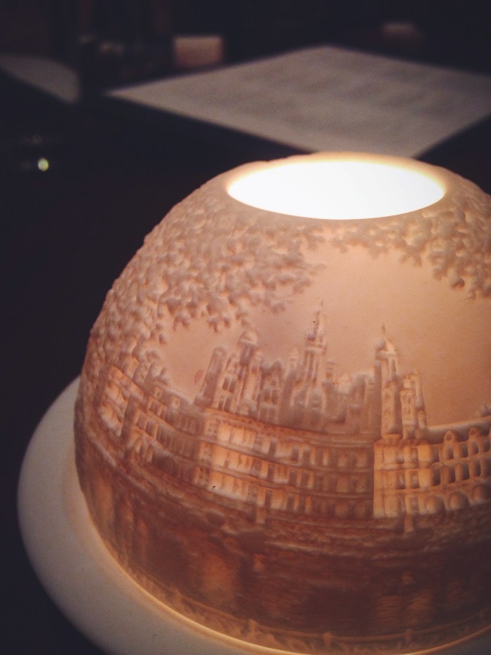 A beautiful votive showcasing the chef's hometown of Saint Hilaire de Loulay in France