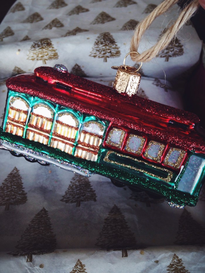Every Christmas I give my hubby a blown glass ornament with the year written on the bottom, this year was a cable car to represent our first home in San Francisco