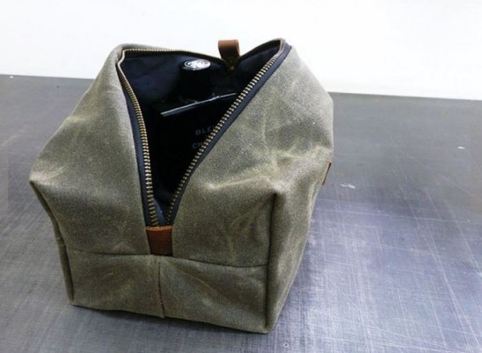 Help your favorite guy travel in style with a handmade dopp kit made out of  waxed canvas. Dopp Kit