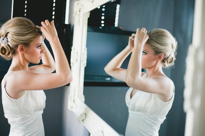 I've always loved big hair and lots of lashes, so that's what I did. Even added a little vintage broach for some sparkle in the back.