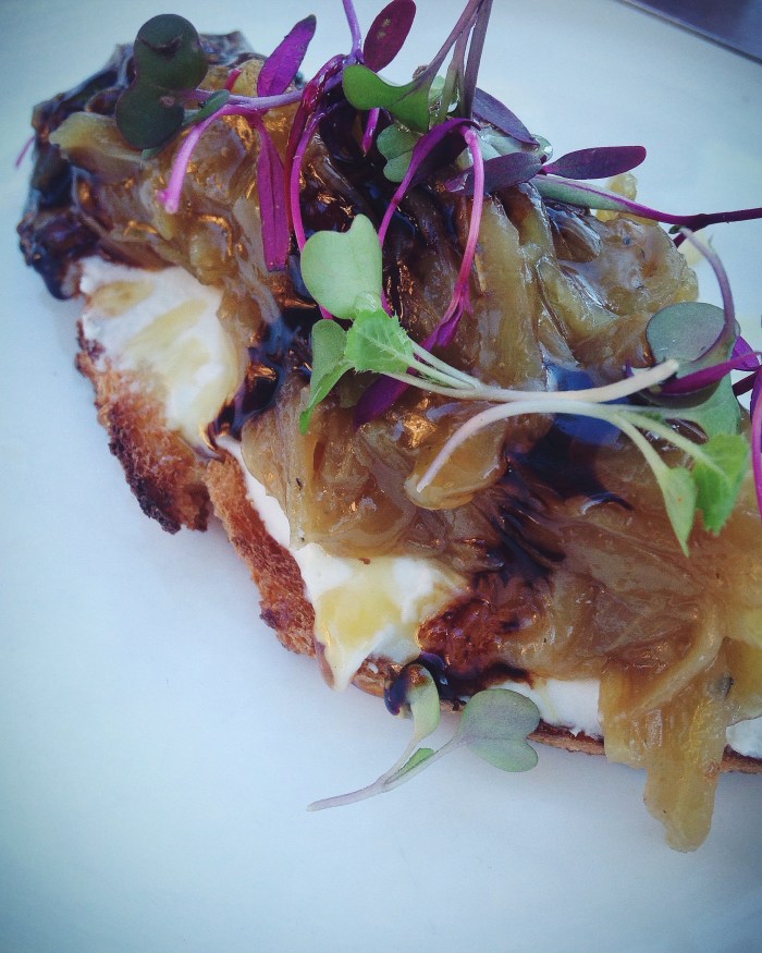 The most incredible crostini at Bravas in Healdsburg...goat cheese, caramelized onions, balsamic, micro greens and truffle honey. Out of this world! 