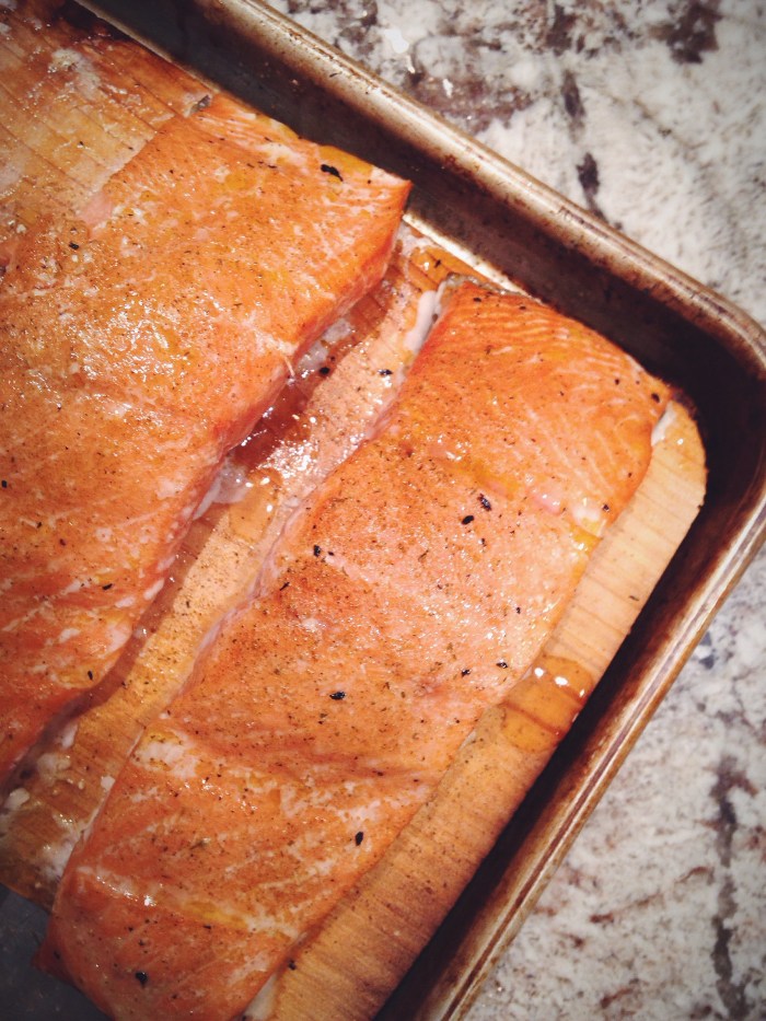 My dad wins! He makes the best salmon ever (doesn't hurt that he caught it himself so it's as fresh as it gets). Cedar plank + Johnny's seafood seasoning.