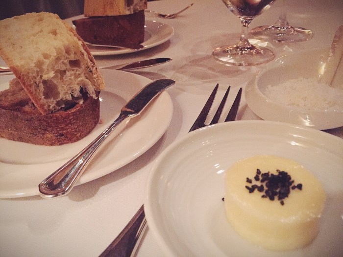 Rosemary sourdough and olive wheat bread served with house made butter and black sea salt