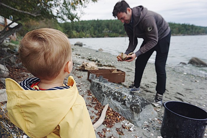Watching daddy clean the crab for dinner